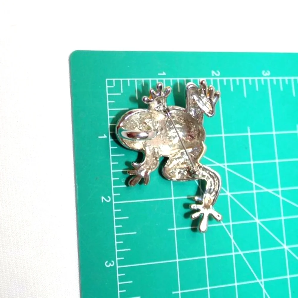 Silver and Gold Trimmed Frog Brooch with Green Eyes